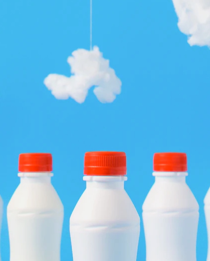 milk bottles with blue sky